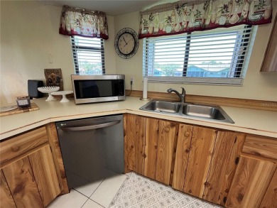 Discover comfort and convenience in this well-maintained on The Club At Pelican Bay - North Course in Florida - for sale on GolfHomes.com, golf home, golf lot