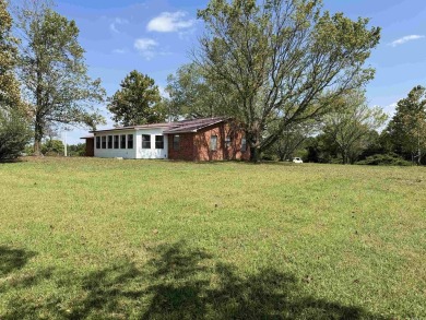 FOR SALE, A BEAUTIFUL REMODELED 3-bedroom, 2-bath brick home in on Coopers Hawk in Arkansas - for sale on GolfHomes.com, golf home, golf lot