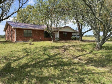 FOR SALE, A BEAUTIFUL REMODELED 3-bedroom, 2-bath brick home in on Coopers Hawk in Arkansas - for sale on GolfHomes.com, golf home, golf lot