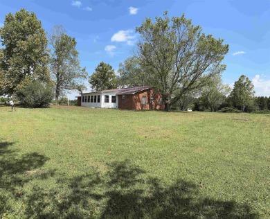 FOR SALE, A BEAUTIFUL REMODELED 3-bedroom, 2-bath brick home in on Coopers Hawk in Arkansas - for sale on GolfHomes.com, golf home, golf lot