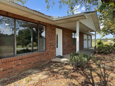 FOR SALE, A BEAUTIFUL REMODELED 3-bedroom, 2-bath brick home in on Coopers Hawk in Arkansas - for sale on GolfHomes.com, golf home, golf lot