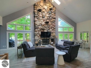Custom-built home featuring a new roof, skylights, AC, and on  in Michigan - for sale on GolfHomes.com, golf home, golf lot