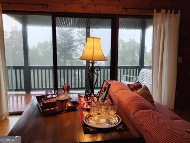 The most adorable, all wood, cabin with a magnificent view in on Sky Valley Resort and Country Club in Georgia - for sale on GolfHomes.com, golf home, golf lot