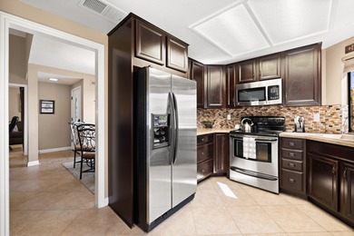 Resort-style living in the gated community of Cathedral Canyon on Cathedral Canyon Golf and Tennis Club in California - for sale on GolfHomes.com, golf home, golf lot