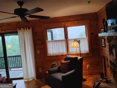 The most adorable, all wood, cabin with a magnificent view in on Sky Valley Resort and Country Club in Georgia - for sale on GolfHomes.com, golf home, golf lot