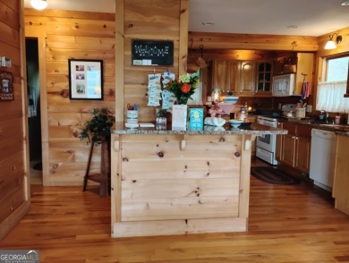 The most adorable, all wood, cabin with a magnificent view in on Sky Valley Resort and Country Club in Georgia - for sale on GolfHomes.com, golf home, golf lot
