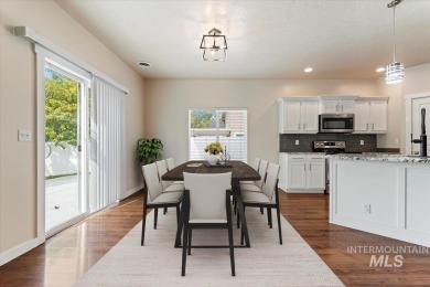 A covered entrance and dramatic vaulted foyer with natural light on Boise Ranch Golf Course, Inc. in Idaho - for sale on GolfHomes.com, golf home, golf lot