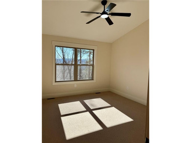 Welcome to this custom-built modern craftsman cabin nestled on White Path Golf Club in Georgia - for sale on GolfHomes.com, golf home, golf lot