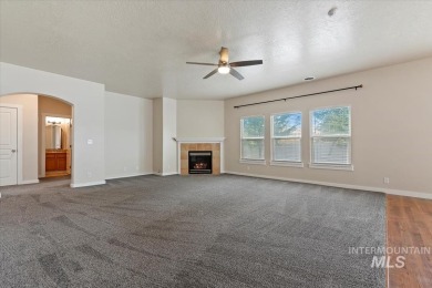 A covered entrance and dramatic vaulted foyer with natural light on Boise Ranch Golf Course, Inc. in Idaho - for sale on GolfHomes.com, golf home, golf lot