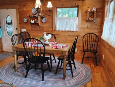 The most adorable, all wood, cabin with a magnificent view in on Sky Valley Resort and Country Club in Georgia - for sale on GolfHomes.com, golf home, golf lot