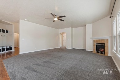A covered entrance and dramatic vaulted foyer with natural light on Boise Ranch Golf Course, Inc. in Idaho - for sale on GolfHomes.com, golf home, golf lot
