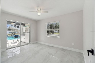 This simply amazing home has been completely remodeled with on Spring Hill Golf Course in Florida - for sale on GolfHomes.com, golf home, golf lot