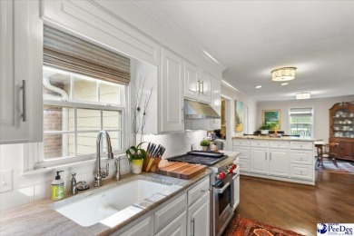 What a find in Forest Hills, updated home fronting Lucas Park on  in South Carolina - for sale on GolfHomes.com, golf home, golf lot