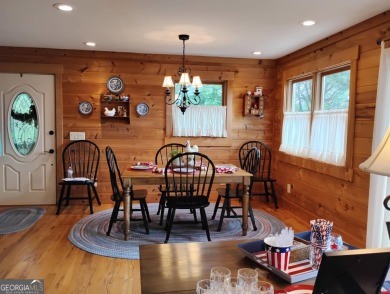 The most adorable, all wood, cabin with a magnificent view in on Sky Valley Resort and Country Club in Georgia - for sale on GolfHomes.com, golf home, golf lot