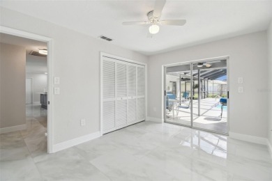 This simply amazing home has been completely remodeled with on Spring Hill Golf Course in Florida - for sale on GolfHomes.com, golf home, golf lot