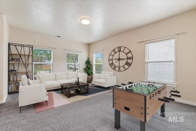 A covered entrance and dramatic vaulted foyer with natural light on Boise Ranch Golf Course, Inc. in Idaho - for sale on GolfHomes.com, golf home, golf lot