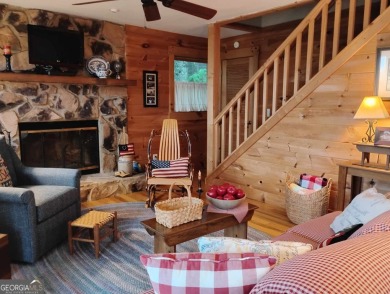 The most adorable, all wood, cabin with a magnificent view in on Sky Valley Resort and Country Club in Georgia - for sale on GolfHomes.com, golf home, golf lot