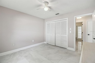 This simply amazing home has been completely remodeled with on Spring Hill Golf Course in Florida - for sale on GolfHomes.com, golf home, golf lot