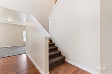 A covered entrance and dramatic vaulted foyer with natural light on Boise Ranch Golf Course, Inc. in Idaho - for sale on GolfHomes.com, golf home, golf lot
