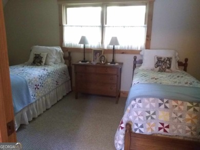 The most adorable, all wood, cabin with a magnificent view in on Sky Valley Resort and Country Club in Georgia - for sale on GolfHomes.com, golf home, golf lot