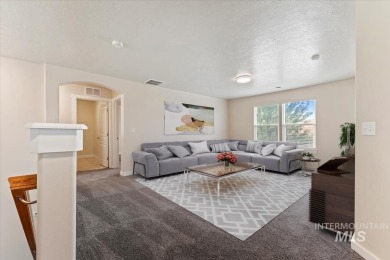 A covered entrance and dramatic vaulted foyer with natural light on Boise Ranch Golf Course, Inc. in Idaho - for sale on GolfHomes.com, golf home, golf lot