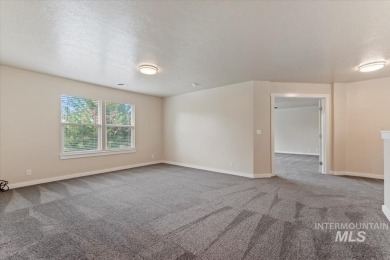 A covered entrance and dramatic vaulted foyer with natural light on Boise Ranch Golf Course, Inc. in Idaho - for sale on GolfHomes.com, golf home, golf lot