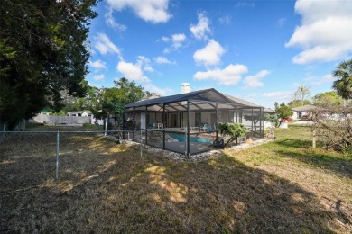 This simply amazing home has been completely remodeled with on Spring Hill Golf Course in Florida - for sale on GolfHomes.com, golf home, golf lot