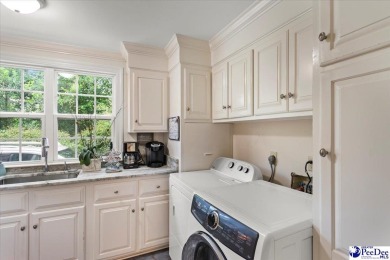 What a find in Forest Hills, updated home fronting Lucas Park on  in South Carolina - for sale on GolfHomes.com, golf home, golf lot
