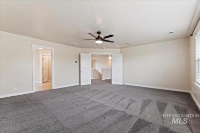 A covered entrance and dramatic vaulted foyer with natural light on Boise Ranch Golf Course, Inc. in Idaho - for sale on GolfHomes.com, golf home, golf lot