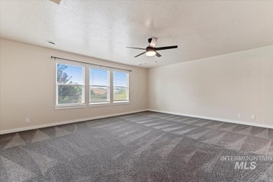 A covered entrance and dramatic vaulted foyer with natural light on Boise Ranch Golf Course, Inc. in Idaho - for sale on GolfHomes.com, golf home, golf lot