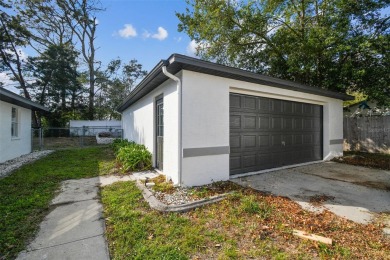 This simply amazing home has been completely remodeled with on Spring Hill Golf Course in Florida - for sale on GolfHomes.com, golf home, golf lot