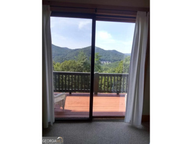 The most adorable, all wood, cabin with a magnificent view in on Sky Valley Resort and Country Club in Georgia - for sale on GolfHomes.com, golf home, golf lot