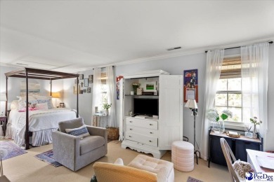 What a find in Forest Hills, updated home fronting Lucas Park on  in South Carolina - for sale on GolfHomes.com, golf home, golf lot