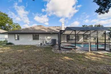 This simply amazing home has been completely remodeled with on Spring Hill Golf Course in Florida - for sale on GolfHomes.com, golf home, golf lot