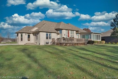 This Gorgeous Brick Ranch w/ oversized 3 car attached garage on Metamora Country Club in Michigan - for sale on GolfHomes.com, golf home, golf lot