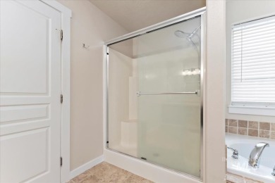 A covered entrance and dramatic vaulted foyer with natural light on Boise Ranch Golf Course, Inc. in Idaho - for sale on GolfHomes.com, golf home, golf lot