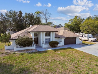 This simply amazing home has been completely remodeled with on Spring Hill Golf Course in Florida - for sale on GolfHomes.com, golf home, golf lot