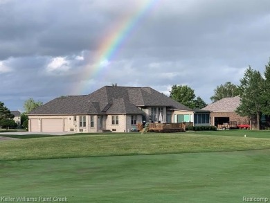 This Gorgeous Brick Ranch w/ oversized 3 car attached garage on Metamora Country Club in Michigan - for sale on GolfHomes.com, golf home, golf lot