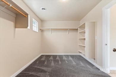 A covered entrance and dramatic vaulted foyer with natural light on Boise Ranch Golf Course, Inc. in Idaho - for sale on GolfHomes.com, golf home, golf lot
