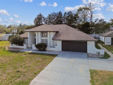 This simply amazing home has been completely remodeled with on Spring Hill Golf Course in Florida - for sale on GolfHomes.com, golf home, golf lot