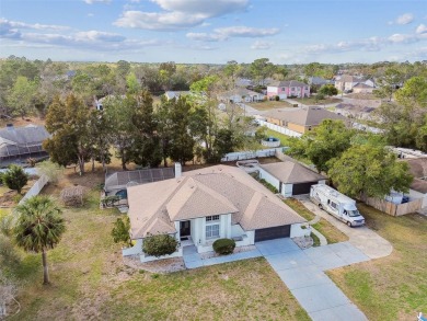 This simply amazing home has been completely remodeled with on Spring Hill Golf Course in Florida - for sale on GolfHomes.com, golf home, golf lot