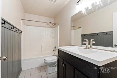 A covered entrance and dramatic vaulted foyer with natural light on Boise Ranch Golf Course, Inc. in Idaho - for sale on GolfHomes.com, golf home, golf lot