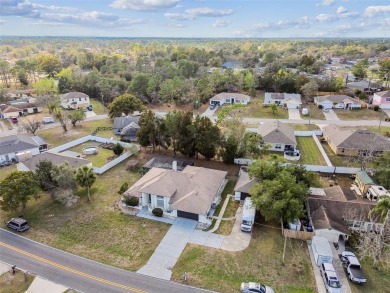 This simply amazing home has been completely remodeled with on Spring Hill Golf Course in Florida - for sale on GolfHomes.com, golf home, golf lot