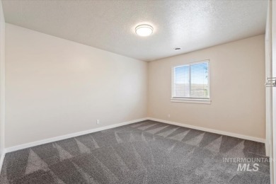 A covered entrance and dramatic vaulted foyer with natural light on Boise Ranch Golf Course, Inc. in Idaho - for sale on GolfHomes.com, golf home, golf lot