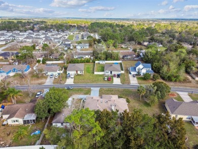 This simply amazing home has been completely remodeled with on Spring Hill Golf Course in Florida - for sale on GolfHomes.com, golf home, golf lot