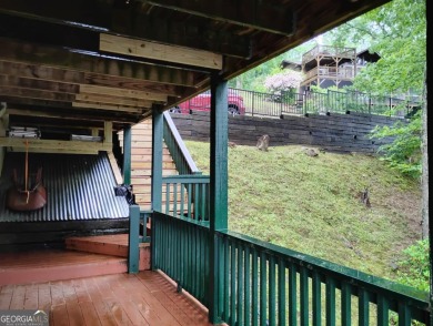 The most adorable, all wood, cabin with a magnificent view in on Sky Valley Resort and Country Club in Georgia - for sale on GolfHomes.com, golf home, golf lot