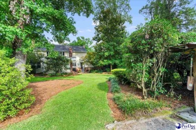 What a find in Forest Hills, updated home fronting Lucas Park on Florence Country Club in South Carolina - for sale on GolfHomes.com, golf home, golf lot