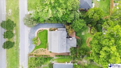 What a find in Forest Hills, updated home fronting Lucas Park on Florence Country Club in South Carolina - for sale on GolfHomes.com, golf home, golf lot