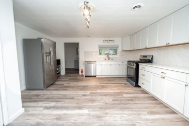 Amazing remodel just completed on this 4 bed 2 bath home. 2 car on Pine View Highlands Golf Course in Michigan - for sale on GolfHomes.com, golf home, golf lot