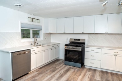 Amazing remodel just completed on this 4 bed 2 bath home. 2 car on Pine View Highlands Golf Course in Michigan - for sale on GolfHomes.com, golf home, golf lot